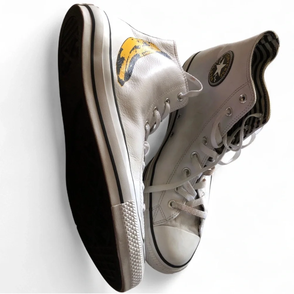 Converse White High-Top Sneakers with Yellow Accent and Black Sole